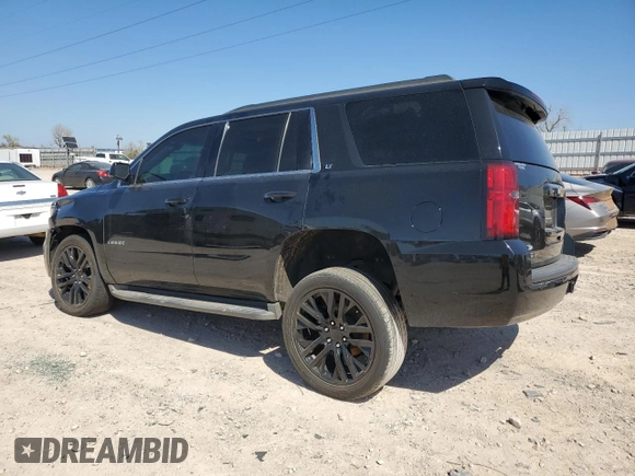 2015 Chevrolet Tahoe LT with VIN 1GNSCBKC0FR193894, listed as a Copart auction lot 49700495 with 179,127 mi miles and Salvage Title. Bid and sale history available at DreamBid. Image 2.
