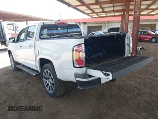 2018 GMC Canyon 4WD Denali z VIN 1GTP6EE11J1178961, wystawiony jako IAAI lot #42499884 z przebiegiem 71 309 mil mil oraz . Historia ofert i sprzedaży dostępna na DreamBid. Obrazek 3.