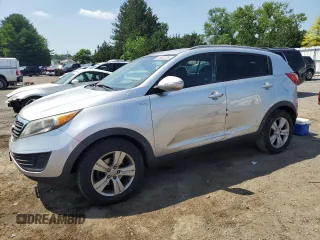 2013 Kia Sportage LX with VIN KNDPBCA24D7521374, listed as a Copart auction lot 61654725 with 146,378 mi miles and Salvage title. Bid and sale history available at DreamBid. Image 1.