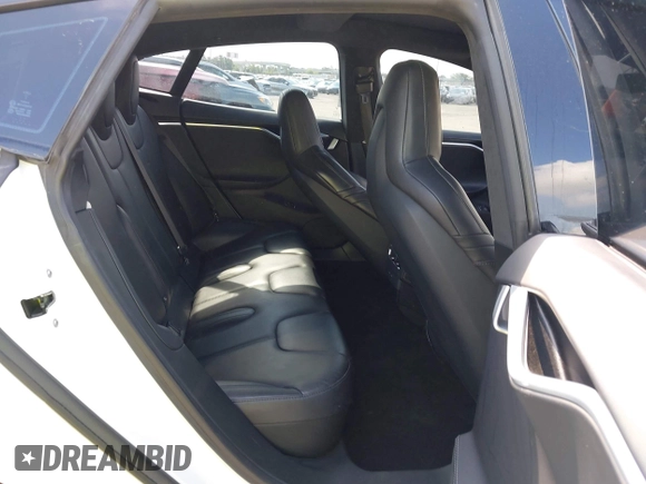 2016 Tesla Model S 70 z VIN 5YJSA1E11GF159425, wystawiony jako IAAI lot #42377639 z przebiegiem 79 767 mil mil oraz . Historia ofert i sprzedaży dostępna na DreamBid. Obrazek 8.