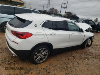 2020 BMW X2 sDrive28i with VIN WBXYH9C08L5P33368, listed as a Copart auction lot 69129512 with 66,918 mi miles. Bid and sale history available at carsss.com. Image 3.