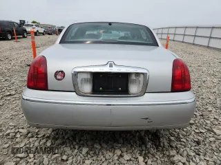 1998 Lincoln Town Car Cartier z VIN 1LNFM83W6WY649580, wystawiony jako Copart lot #59198865 z przebiegiem 253 735 mil mil oraz Czysty tytuł • Clean title. Historia ofert i sprzedaży dostępna na DreamBid. Obrazek 6.