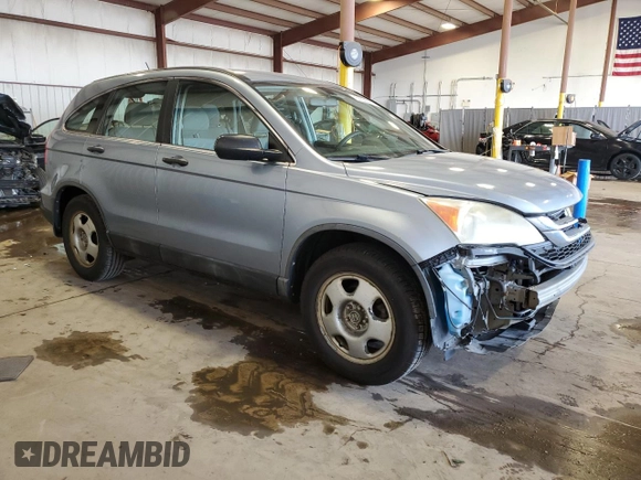 2011 Honda CR-V LX z VIN 5J6RE4H3XBL058952, wystawiony jako Copart lot #60530205 z przebiegiem 165 349 mil mil oraz Szkoda całkowita • Salvage title. Historia ofert i sprzedaży dostępna na DreamBid. Obrazek 4.