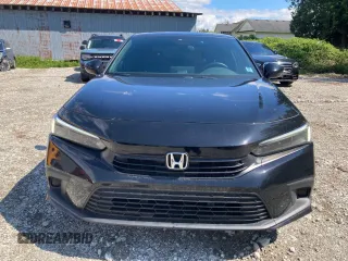 2023 Honda Civic Sport z VIN 2HGFE2F50PH108541, wystawiony jako Copart lot #53641295 z przebiegiem 27 991 mil mil oraz Szkoda całkowita • Salvage title. Historia ofert i sprzedaży dostępna na DreamBid. Obrazek 5.