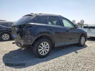 2016 Mazda CX-5 Touring with VIN JM3KE4CY2G0867484, listed as a Copart auction lot 54545435 with 100,664 mi miles and Salvage Title. Bid and sale history available at carsss.com. Image 3.