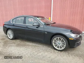 2012 BMW 3 Series 328i with VIN WBA3A5C57CF345040, listed as a Copart auction lot 63761735 with 106,665 mi miles and Clean title. Bid and sale history available at DreamBid. Image 4.