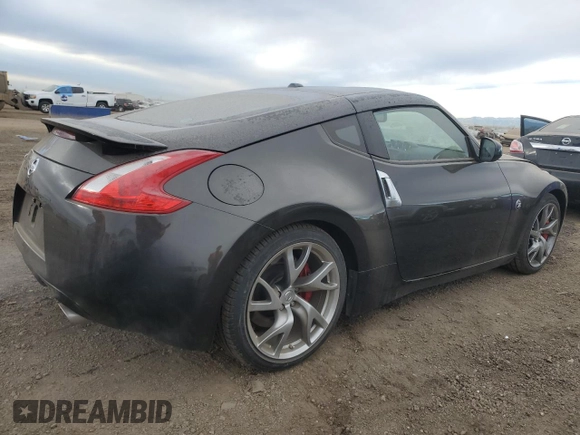 2014 Nissan 370Z Touring with VIN JN1AZ4EH2EM633814, listed as a Copart auction lot 84120274 with 22,979 mi miles and Salvage Title. Bid and sale history available at carsss.com. Image 3.