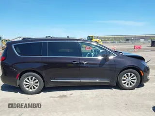 2017 Chrysler Pacifica Touring L with VIN 2C4RC1BG0HR747551, listed as a IAAI auction lot 42139664 with 120,057 mi miles and . Bid and sale history available at DreamBid. Image 12.