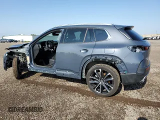 2024 Mazda CX-50 Premium with VIN 7MMVABDY1RN222772, listed as a Copart auction lot 61792465 with 4,875 mi miles and Salvage title. Bid and sale history available at DreamBid. Image 2.