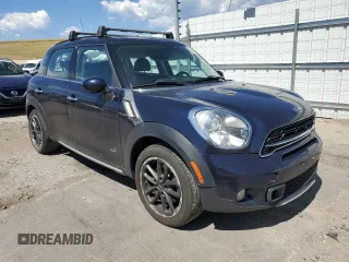 2016 MINI Countryman S with VIN WMWZC5C54GWT38489, listed as a Copart auction lot 63834335 with 102,564 mi miles and Salvage title. Bid and sale history available at DreamBid. Image 4.