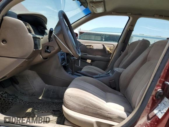 1999 Toyota Camry LE z VIN JT2BG22K6X0274398, wystawiony jako Copart lot #57263795 z przebiegiem 202 944 mil mil oraz Szkoda całkowita • Salvage title. Historia ofert i sprzedaży dostępna na DreamBid. Obrazek 7.