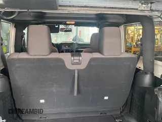 2017 Jeep Wrangler Willys Wheeler with VIN 1C4AJWAGXHL602088, listed as a Copart auction lot 45524745 with 101,847 mi miles and Clean Title. Bid and sale history available at DreamBid. Image 6.