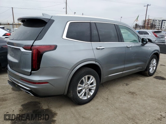 2023 Cadillac XT6 FWD Luxury z VIN 1GYKPAR47PZ147139, wystawiony jako Copart lot #50783595 z przebiegiem 27 684 mil mil oraz Szkoda całkowita • Salvage title. Historia ofert i sprzedaży dostępna na DreamBid. Obrazek 3.