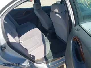 1999 Mercury Sable GS with VIN 1MEFM50U0XG609913, listed as a IAAI auction lot 41783308 with 80,022 mi miles. Bid and sale history available at carsss.com. Image 8.