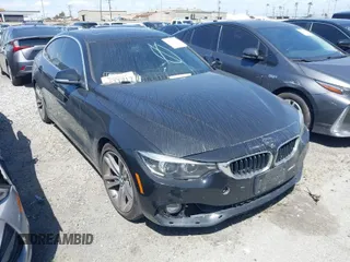 2019 BMW 4 Series 430i with VIN WBA4J1C59KBM16385, listed as a IAAI auction lot 41708630 with 97,993 mi miles. Bid and sale history available at carsss.com. Image 1.