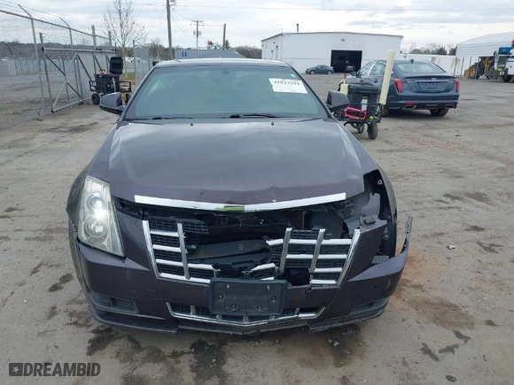 2014 Cadillac CTS Coupe with VIN 1G6DA1E39E0162260, listed as a IAAI auction lot 41823794 with 75,427 mi miles. Bid and sale history available at carsss.com. Image 12.