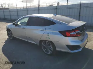 2020 Honda Clarity Touring z VIN JHMZC5F3XLC001848, wystawiony jako Copart lot #56748915 z przebiegiem 89 652 mil mil oraz Szkoda całkowita • Salvage title. Historia ofert i sprzedaży dostępna na DreamBid. Obrazek 2.