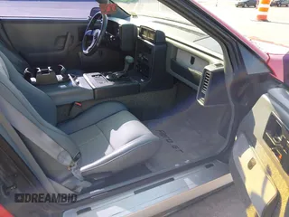 1986 Pontiac Fiero z VIN 1G2PG9791GP267415, wystawiony jako IAAI lot #42461769 z przebiegiem Nie podano mil oraz . Historia ofert i sprzedaży dostępna na DreamBid. Obrazek 5.