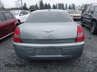 2006 Chrysler 300 C with VIN 2C3KA63H06H286676, listed as a IAAI auction lot 41231230 with 134,565 mi miles. Bid and sale history available at carsss.com. Image 16.