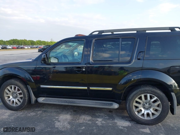 2012 Nissan Pathfinder LE with VIN 5N1AR1NN5CC607403, listed as a IAAI auction lot 41813677 with 217,854 mi miles. Bid and sale history available at carsss.com. Image 14.
