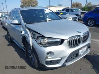 2019 BMW X1 xDrive28i with VIN WBXHT3C56K5L38658, listed as a IAAI auction lot 42496734 with 49,373 mi miles and . Bid and sale history available at DreamBid. Image 1.