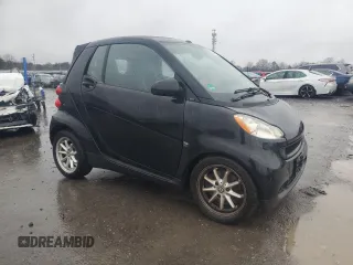 2009 Smart fortwo Passion z VIN WMEEK31X59K270597, wystawiony jako Copart lot #43187955 z przebiegiem 67 842 mil mil oraz Czysty tytuł • Clean title. Historia ofert i sprzedaży dostępna na DreamBid. Obrazek 4.