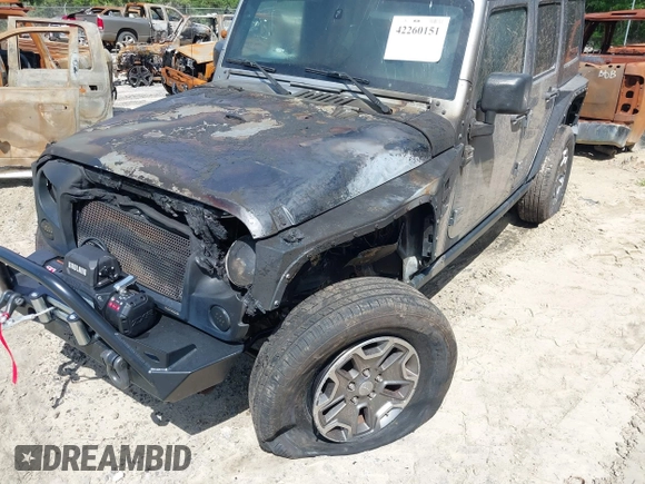 2016 Jeep Wrangler Unlimited Rubicon Hard Rock with VIN 1C4BJWFG6GL265320, listed as a IAAI auction lot 42260151 with Not provided miles and . Bid and sale history available at DreamBid. Image 6.