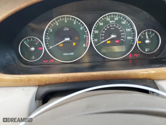 2002 Jaguar X-Type with VIN SAJEA51C12WC33477, listed as a Copart auction lot 83711124 with 165,637 mi miles and Salvage Title. Bid and sale history available at carsss.com. Image 9.