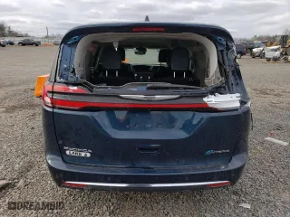 2023 Chrysler Pacifica Hybrid Touring L with VIN 2C4RC1L70PR614642, listed as a Copart auction lot 45933065 with 94,992 mi miles and Salvage Title. Bid and sale history available at carsss.com. Image 6.