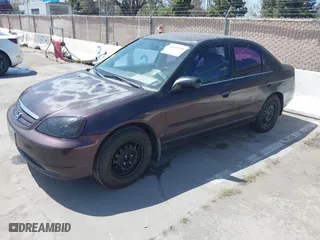 2001 Honda Civic LX with VIN 2HGES165X1H532556, listed as a IAAI auction lot 42008330 with 174,293 mi miles. Bid and sale history available at carsss.com. Image 2.