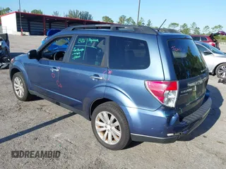 2011 Subaru Forester 2.5X Limited with VIN JF2SHAEC1BH754640, listed as a IAAI auction lot 42018735 with 130,780 mi miles. Bid and sale history available at carsss.com. Image 3.