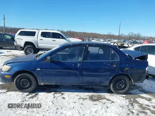 2003 Mitsubishi Lancer ES with VIN JA3AJ26E13U0A3996, listed as a IAAI auction lot 41251250 with 223,311 mi miles. Bid and sale history available at carsss.com. Image 13.