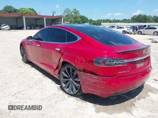 2016 Tesla Model S 90D with VIN 5YJSA1E48GF144821, listed as a IAAI auction lot 42206473 with 129,624 mi miles and . Bid and sale history available at DreamBid. Image 3.