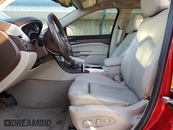 2015 Cadillac SRX Performance Collection z VIN 3GYFNCE37FS525052, wystawiony jako Copart lot #50101105 z przebiegiem 138 471 mil mil oraz Szkoda całkowita • Salvage title. Historia ofert i sprzedaży dostępna na DreamBid. Obrazek 7.