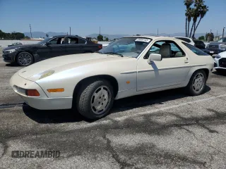 1988 Porsche 928 z VIN WP0JB0927JS860826, wystawiony jako Copart lot #59000165 z przebiegiem 56 317 mil mil oraz Szkoda całkowita • Salvage title. Historia ofert i sprzedaży dostępna na DreamBid. Obrazek 1.