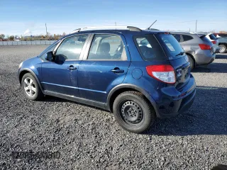 2010 Suzuki SX4 Touring with VIN JS2YB5A71A6310393, listed as a Copart auction lot 77673534 with 65,987 mi miles and Clean Title. Bid and sale history available at carsss.com. Image 2.