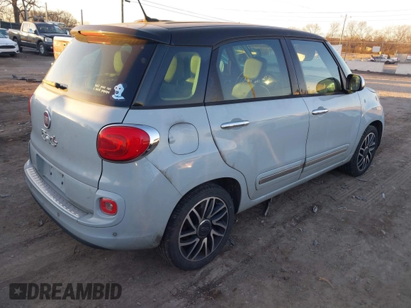 2015 FIAT 500L Lounge with VIN ZFBCFACH8FZ031314, listed as a IAAI auction lot 41392026 with 184,145 mi miles. Bid and sale history available at carsss.com. Image 4.