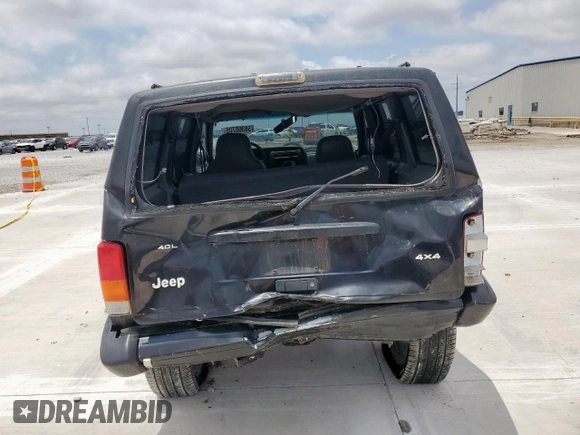 1998 Jeep Cherokee Sport z VIN 1J4FJ68S8WL193483, wystawiony jako Copart lot #58368705 z przebiegiem 94 462 mil mil oraz Szkoda całkowita • Salvage title. Historia ofert i sprzedaży dostępna na DreamBid. Obrazek 6.