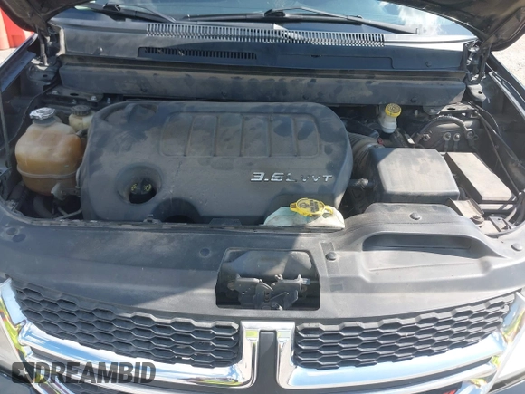 2013 Dodge Journey SXT with VIN 3C4PDDBG1DT615217, listed as a IAAI auction lot 42728052 with 234,347 mi miles and . Bid and sale history available at DreamBid. Image 10.