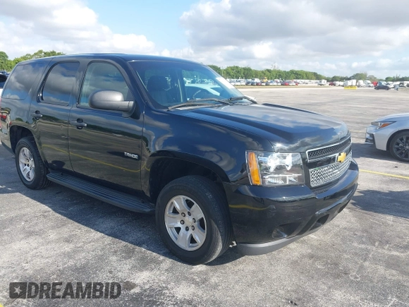 2013 Chevrolet Tahoe Commercial z VIN 1GNLC2E05DR218100, wystawiony jako IAAI lot #42182072 z przebiegiem 162 888 mil mil oraz . Historia ofert i sprzedaży dostępna na DreamBid. Obrazek 1.