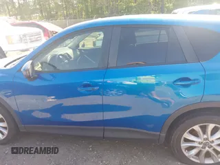 2013 Mazda CX-5 Grand Touring with VIN JM3KE2DEXD0123314, listed as a IAAI auction lot 42064266 with 288,935 mi miles. Bid and sale history available at carsss.com. Image 14.