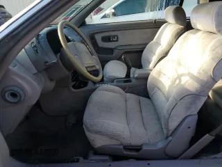 1990 Chrysler LeBaron z VIN 1C3XJ4533LG472070, wystawiony jako Copart lot #74314104 z przebiegiem 97 354 mil mil oraz Szkody całkowita. Historia ofert i sprzedaży dostępna na DreamBid. Obrazek 7.