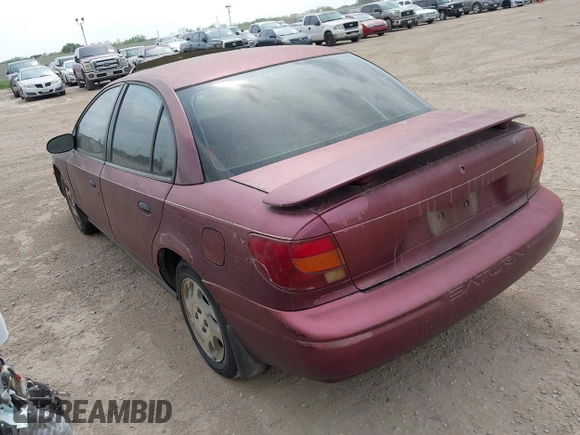2002 Saturn SL z VIN 1G8ZF52802Z248375, wystawiony jako IAAI lot #42180352 z przebiegiem Nie podano mil oraz . Historia ofert i sprzedaży dostępna na DreamBid. Obrazek 3.
