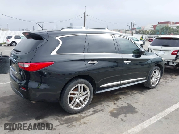 2013 Infiniti JX35 with VIN 5N1AL0MN7DC310972, listed as a IAAI auction lot 41859376 with 117,679 mi miles. Bid and sale history available at carsss.com. Image 4.