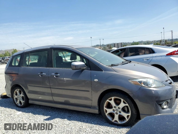2009 Mazda 5 Sport with VIN JM1CR29L990345262, listed as a Copart auction lot 56575454 with Not Provided miles and Salvage Title. Bid and sale history available at DreamBid. Image 4.