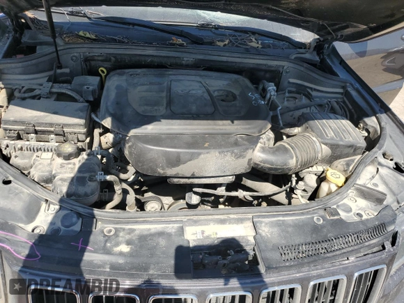 2016 Jeep Grand Cherokee Laredo with VIN 1C4RJFAG2GC328841, listed as a Copart auction lot 63553435 with 100,472 mi miles and Salvage title. Bid and sale history available at DreamBid. Image 12.