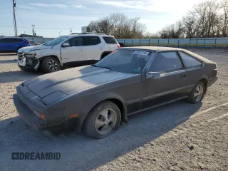 1982 Toyota Supra z VIN JT2MA67LXC0032341, wystawiony jako Copart lot #49951115 z przebiegiem 76 389 mil mil oraz Czysty tytuł • Clean title. Historia ofert i sprzedaży dostępna na DreamBid. Obrazek 1.