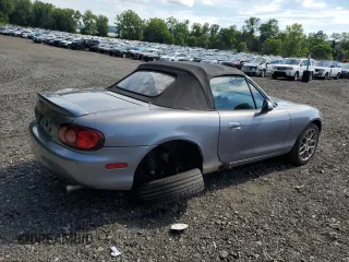 2002 Mazda MX-5 Miata Cloth z VIN JM1NB353520224582, wystawiony jako Copart lot #63669835 z przebiegiem 88 455 mil mil oraz Szkoda całkowita • Salvage title. Historia ofert i sprzedaży dostępna na DreamBid. Obrazek 3.