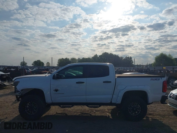 2021 Chevrolet Colorado 4WD Z71 with VIN 1GCGTDEN6M1166282, listed as a IAAI auction lot 40316921 with 35,515 mi miles and . Bid and sale history available at DreamBid. Image 14.