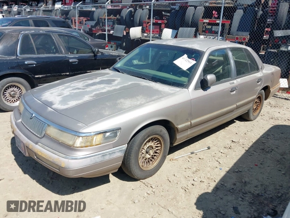 1994 Mercury Grand Marquis LS z VIN 2MELM75W1RX649536, wystawiony jako IAAI lot #41782591 z przebiegiem 111 984 mil mil oraz . Historia ofert i sprzedaży dostępna na DreamBid. Obrazek 2.